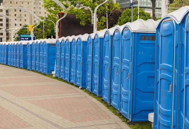 a row of portable restrooms at a fairground, offering visitors a clean and hassle-free experience in canby